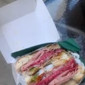 A salt beef bagel in a takeaway box from Shan's visit